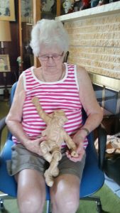 unexpected friendships: lenore and julia Friends Life Care Member Julia Haas showing off art