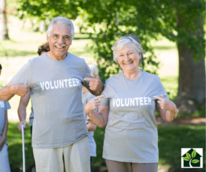couple of seniors with volunteer tshirts