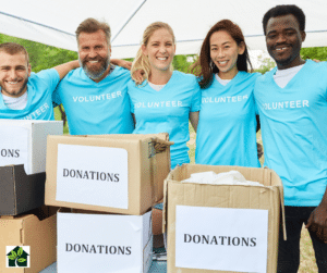 group of volunteers with donations boxes