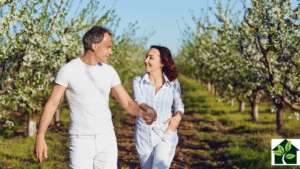 couple of adults walking outside happily