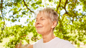 happy senior woman in nature